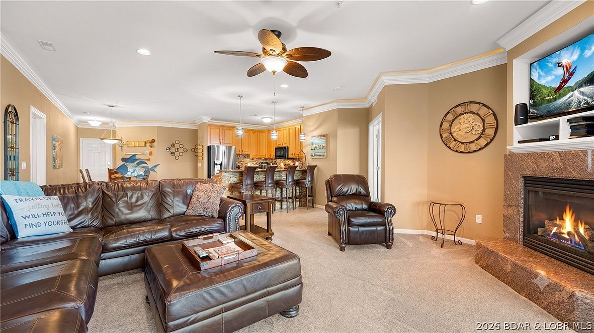 Open great room flowing to kitchen